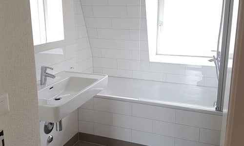 Badezimmer mit Hexagon Fliessen